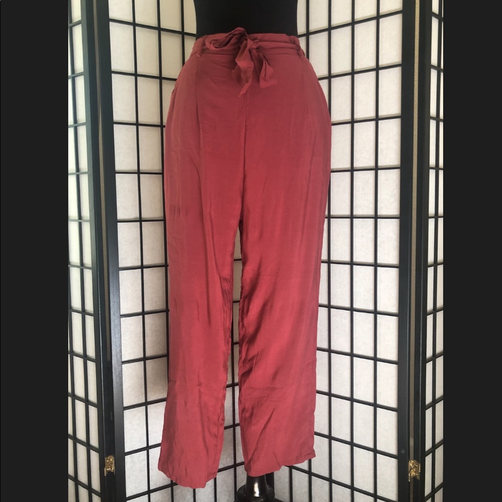 SELF TIE WAIST PALAZZO PANTS.